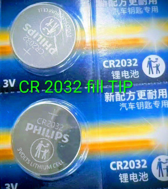 Two Philips CR2032 3V lithium coin batteries in packaging.