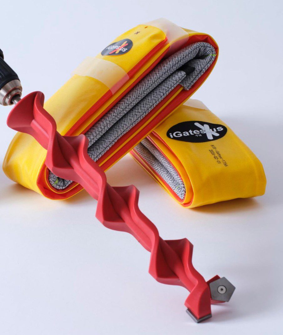 Yellow wrist weights with a red spiral resistance band attached.