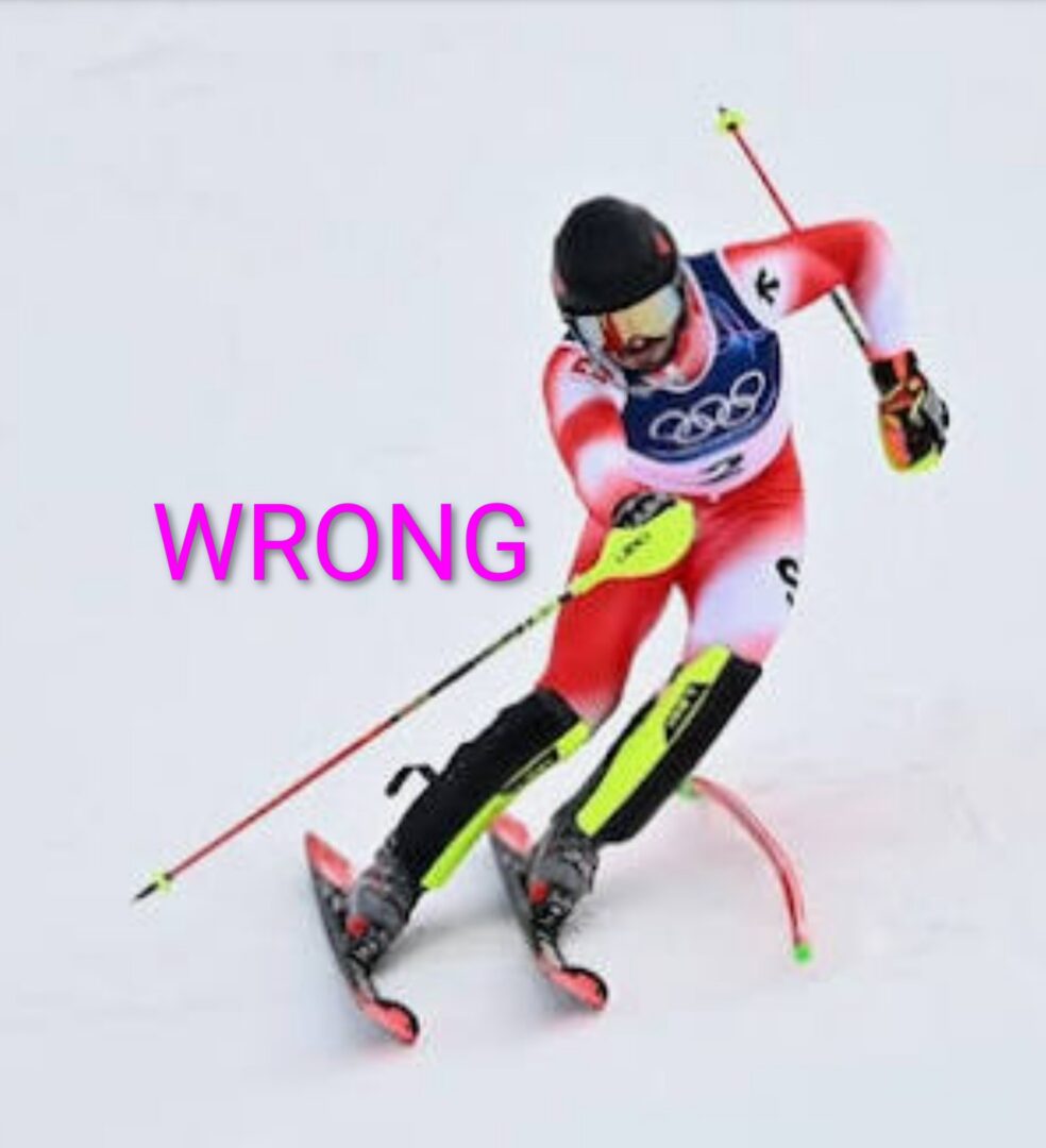 Olympic slalom skier in red suit