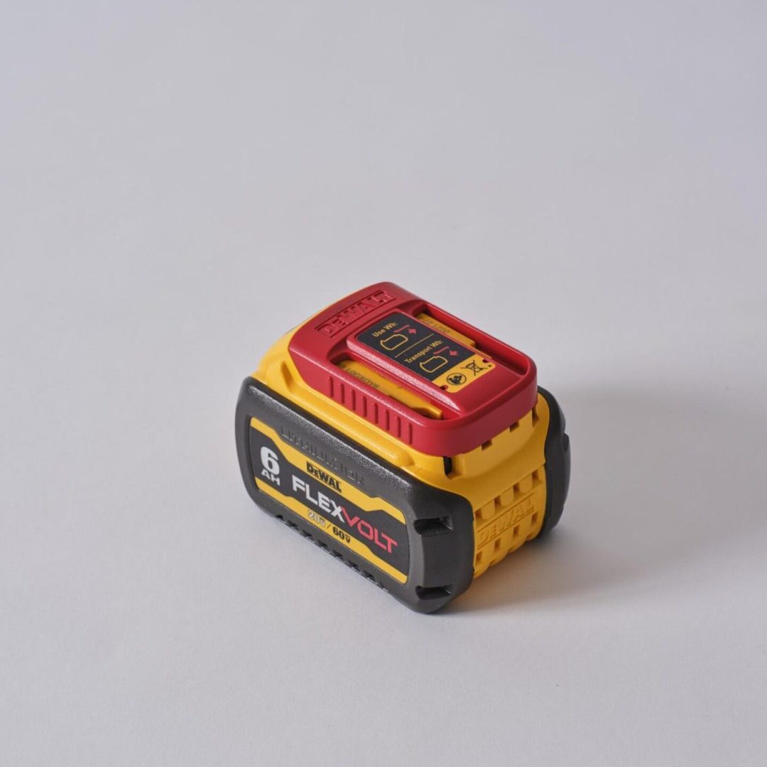 A compact DeWalt battery pack against a plain background.